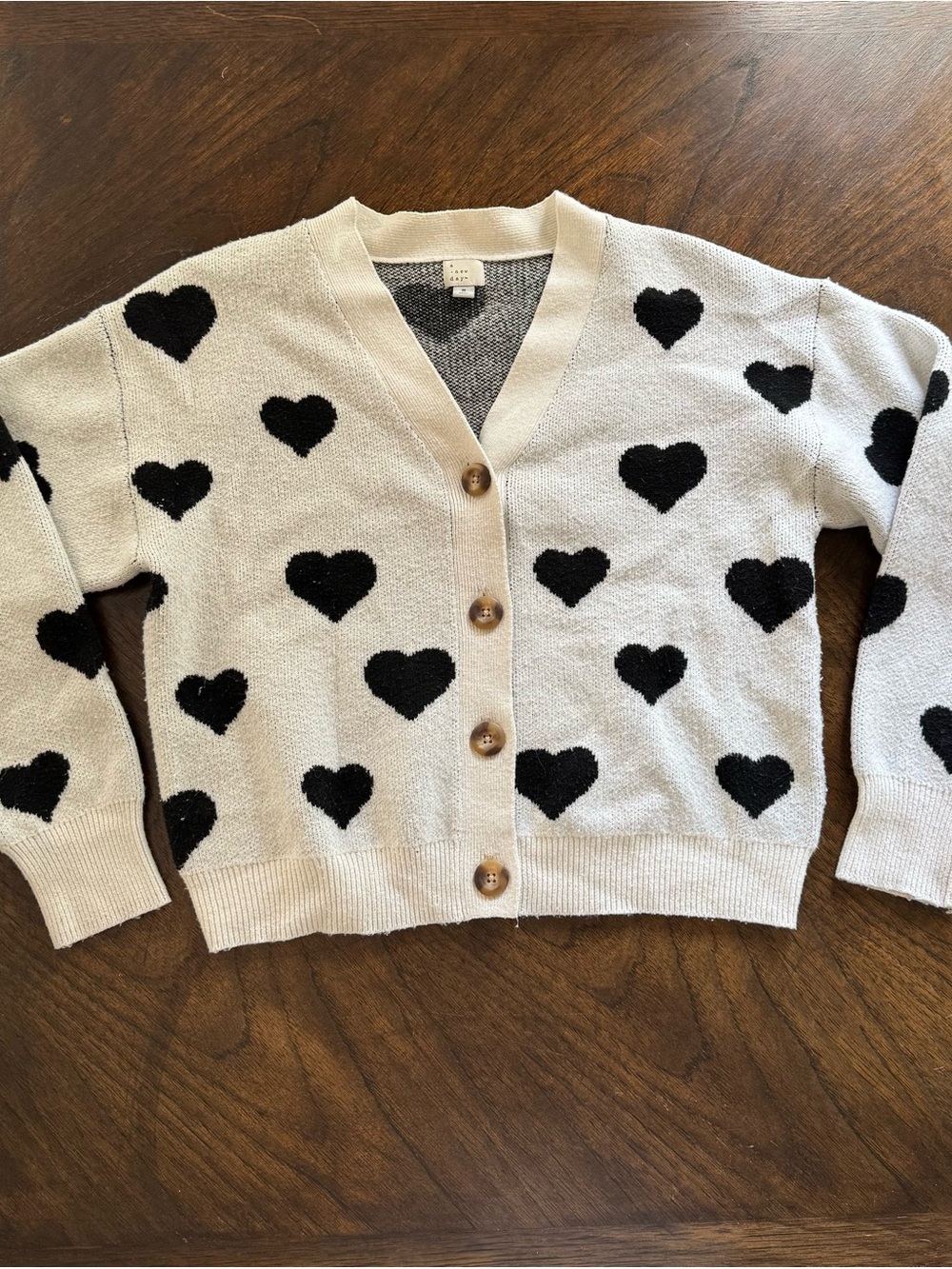 a new day Cream Cardigan with Black Heart Motif